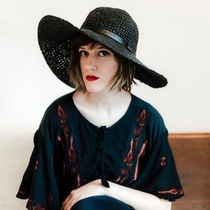 black wide brim straw hat